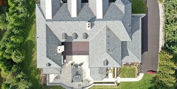Aerial view of a completed commercial roofing project by Global Roofing and Construction