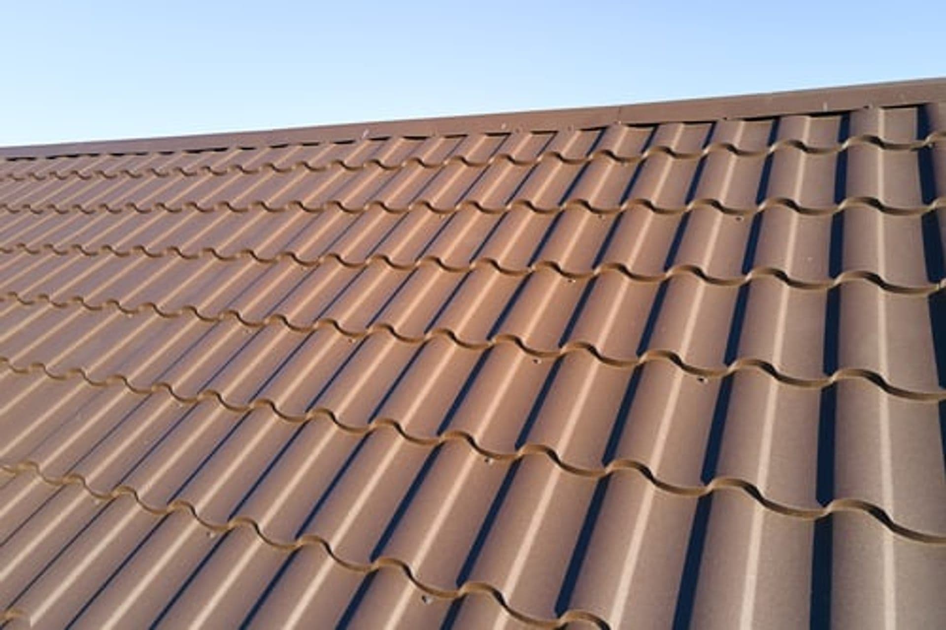 Standing-seam metal roof installed on a Kansas property by Global Roofing and Construction