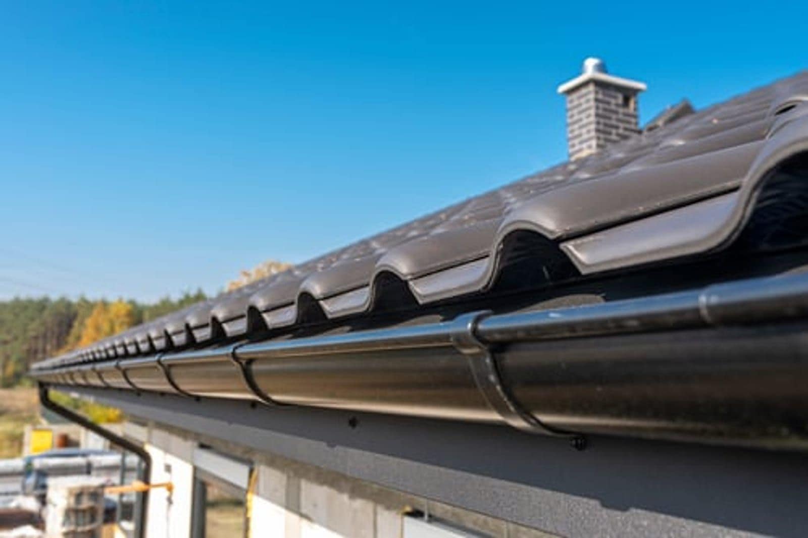 Seamless aluminum gutter and fascia installed along a residential roofline in Wichita, Kansas